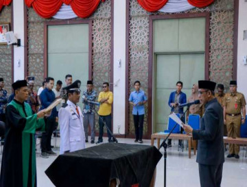 Pj Sekda Kampar Lantik Nasrullah Kades Tanjung Koto Kampar Hulu