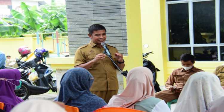 Tindakan Nyata Kendalikan Inflasi  Bupati Kampar,  Buka Pasar Murah di Kec. Bangkinang Kota.