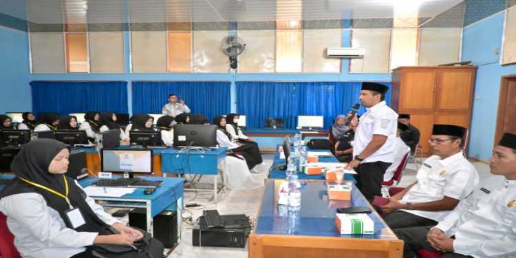 Asisten I Setda Kampar Buka Ujian CAT Seleksi Program SKSS Basnaz Kab. Kampar Tahun 2026