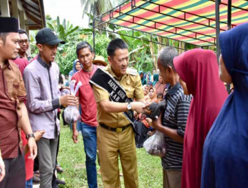 Potong 10 Ekor Kerbau, Pj Bupati Kampar Apresiasi Desa Teratak Jalankan Program Ketahan Pangan