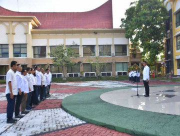 Asisten I Setda Kampar Ahmad Yuzar Pimpin Apel Perdana Pasca  Hari Raya Idul Fitri 1444 H/2023 M