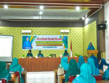 Ketua TP-PKK Kampar Ricana Djayanti Hambali Buka Pelatihan Gelari Pelangi dan Pembentukan Rumah