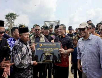 Wakili Pj Bupati Kampar, Kadis PUPR Afdal, ST, MT Dampingi Pj Gubri Resmikan Jembatan