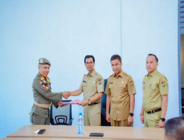 Pj.Sekda Kampar Ahmad Yuzar Saksikan Sertijab Plt.Kepala Dinas Kominfo Dari Irwan Ar Ke Arizon SE