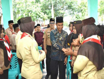 Pj Sekda Kampar Melepas Secara Resmi Peserta Pramuka Kwarcab Kampar untuk Raimuna Daerah 2024