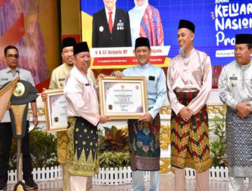 Dihari Harganas Provinsi Riau Tahun 2024, Pj Bupati Kampar Terima Penghargaan Terbaik II Kinerja