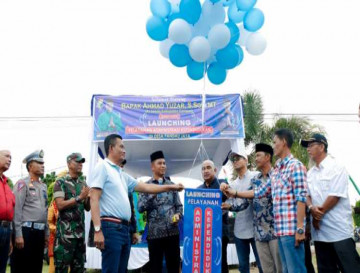 Pj Sekda Kampar Ahmad Yuzar Launching Pelayanan Adminsitrasi Kependudukan di Desa Pandau Jaya