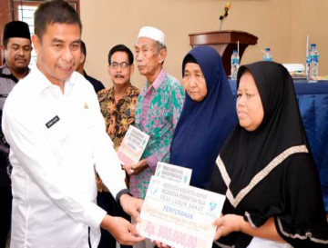 Pj Sekda Kampar Komitmen Dorong Ekonomi Lokal Untuk Meningkatkan Kesejahteraan Masyarakat.