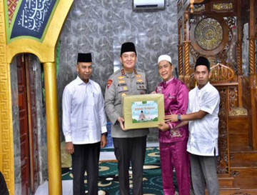 Bupati Kampar Dampingi Safari Ramadhan Kapolda Riau di Desa Pulau Lawas Bangkinang.