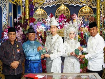 Jadi Saksi Nikah M. Ikhsan dan Rara, Bupati Kampar Sampaikan Nasehat Pernikahan