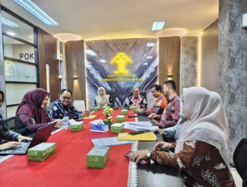 Pemkab Kampar Bahas Rancangan Perbup Pengelolaan Perparkiran di Kementerian Hukum Riau